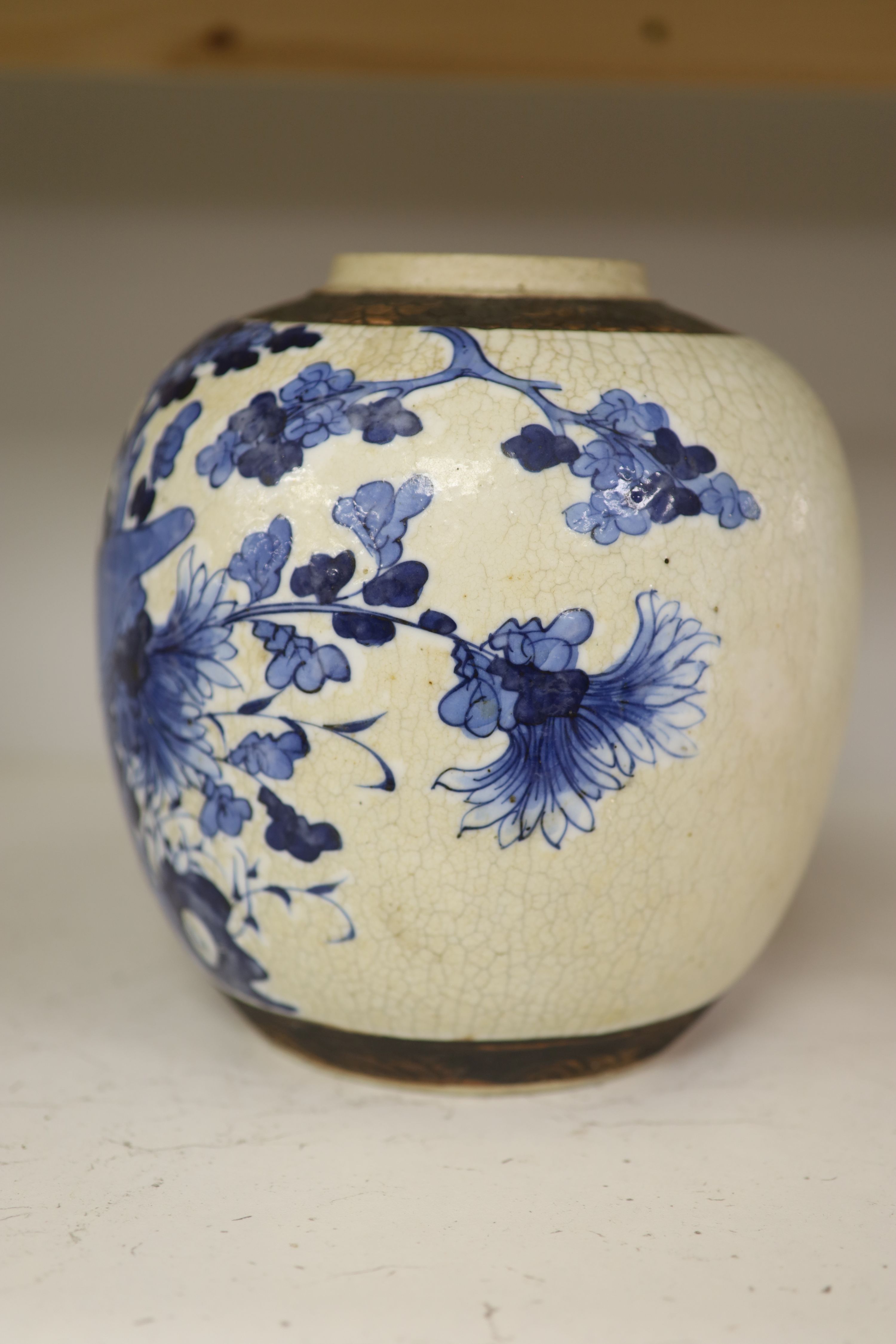 A 19th century/early 20th century Chinese blue and white crackle glaze jar, height 22cm